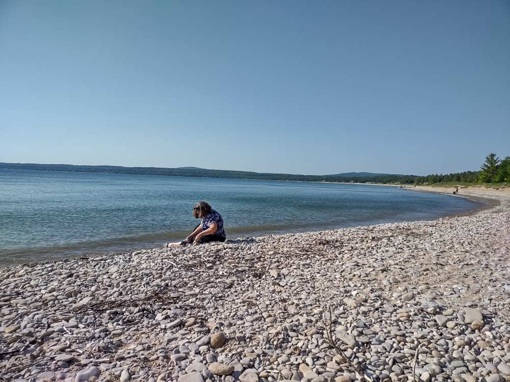 Looking for Petrosky stones. The beach was just over the hill from our campsite